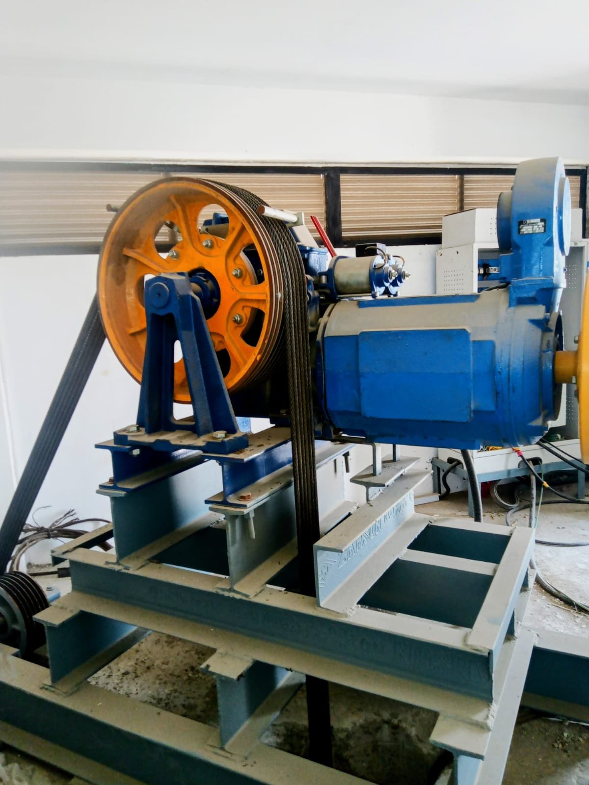 Blue traction motor with orange drive sheave